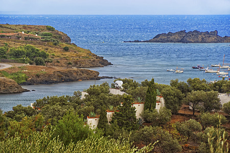 Port Lligat Gala Dali museum yard outskirts and harbor at stormy weatherのeditorial素材