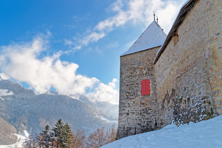 Beautiful winter landscape with the castle of Gruyeres and Alp mountains in the background. Region of Gruyere, province of Fribourg, Switzerlandのeditorial素材