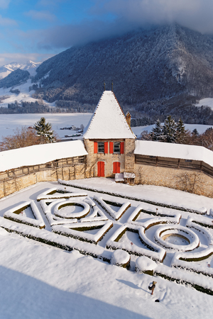 GRUYERE, SWITZERLAND - DECEMBER 31, 2014: French garden behind the castle of Gruyeres in Switzerland. It is an important tourist location in the upper valley of the Saane riverのeditorial素材
