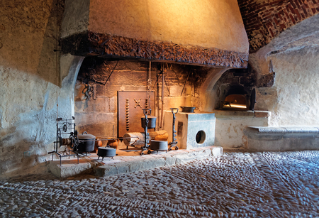 GRUYERE, SWITZERLAND - DECEMBER 31, 2014: Ancient houseware displayed in the castle of Gruyeres in Switzerland. It is a Swiss heritage site of national significanceのeditorial素材