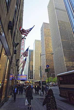 NEW YORK, USA - May 07, 2015: People walk past Radio City Music Hall at 6th Avenue in New York....