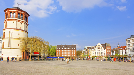 DUSSELDORF, GERMANY - MAY 3, 2013: Schiffahrt museum Schlossturm in the city center of Dusseldorf. Tourists nearbyのeditorial素材