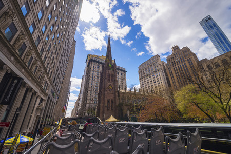New York, USA - April 24, 2015: Trinity Church in Manhattan viewed from excursion bus. New York,...