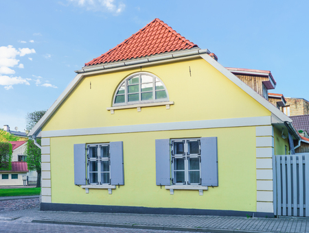 Yellow painted Old house in Ventspils of Latvia. It is a city in the Courland region of Latvia. Latvia is one of the Baltic countriesのeditorial素材