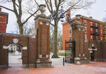 Entrance gates and a dormitory building in Harvard Yard of Harvard University in Cambridge, Massachusetts, MA, USAのeditorial素材