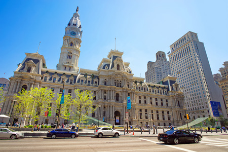 Philadelphia, USA - May 4, 2015: Philadelphia City Hall with William Penn statue on Tower. View from the street. Tourists in the streetのeditorial素材