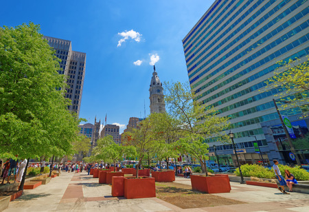 Philadelphia, USA - May 4, 2015: Love Park with tourists and Philadelphia City Hall on background. Tourists in the park. Pennsylvania, USA.のeditorial素材