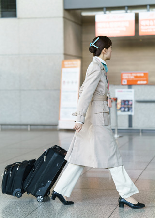 Incheon, South Korea - February 15, 2016: Asian Korean air flight stewardess in Incheon International airport. It is one of the largest and busiest world airports.のeditorial素材