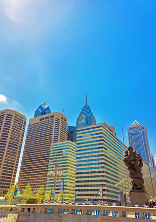 Philadelphia, USA - May 4, 2015: Government of the people sculpture and Skyline of skyscrapers in Philadelphia, Pennsylvania, the USA.のeditorial素材