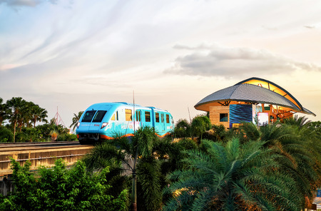 Singapore, Singapore - March 1, 2016: Sentosa Express monorail train connecting Harborfront and Sentosa Island in Singapore in the eveningのeditorial素材