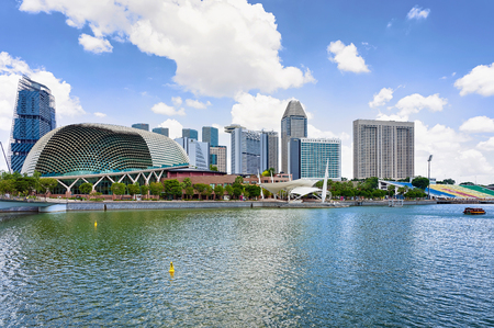Singapore, Singapore - March 1, 2016: Esplanade - Theaters on the Bay. Skyline in Downtown Core at Marina Bay Financial Center of Singapore.のeditorial素材