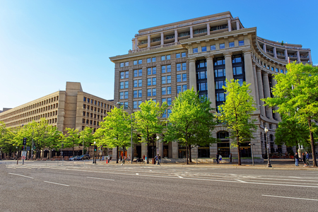 United States Navy Memorial and FBI building situated in Washington D.C., USA. Navy Memorial was established on October 13, 1987. It is associated with the Memorial is the Naval Heritage Center.のeditorial素材