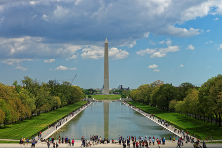 Washington D.C., USA - May 2, 2015: Washington monument with the pool in front of it in Washington D.C., USA. It is one of the most popular and visited tourist attractions.のeditorial素材