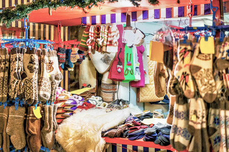 Riga, Latvia - December 24, 2016: One of the colorful stalls at the Christmas Market in Riga, Latvia. The market took place from the beginning of December. At this stall people could buy warm clothes.のeditorial素材