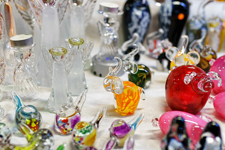 Little animal and angels statues made of glass at the Christmas market in old Riga, Latvia. The fair is one of the most popular ways of Christmas celebrations in the whole world.の写真素材