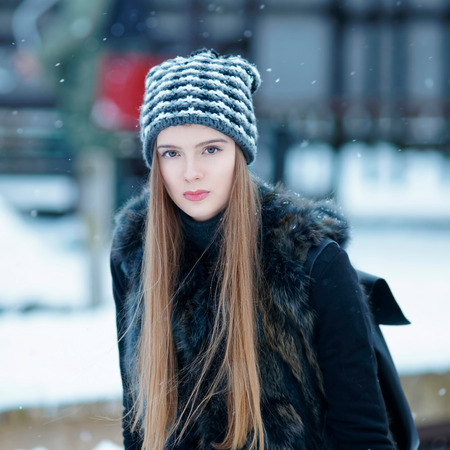 Young girl in winter Trakai, Lithuania.の写真素材