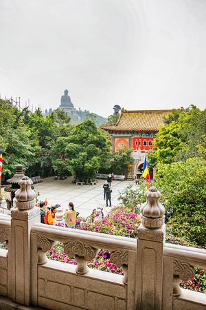 Hong Kong, Hong Kong -  January 11, 2012: Big Buddha statue at Ngong Ping and Po Lin Monastery on Lantau Island in Hong Kong. People on the backgroundのeditorial素材