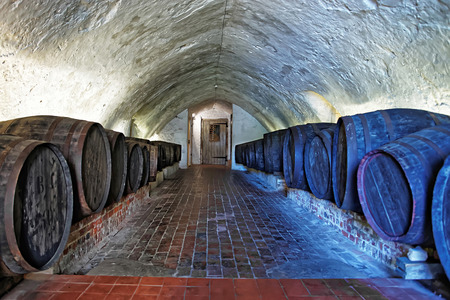 Leeds, England - May 3, 2011: Basement with tierce of wine in Leeds Castle in Kent in UK. The castle was built in the twelfth century as a king residence. Now it is open to the public.のeditorial素材