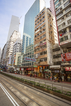 Hong Kong, Hong Kong - January 9, 2012: Modern Skyscrapers and busy street on Hong Kong Island in HK. People on the background.のeditorial素材