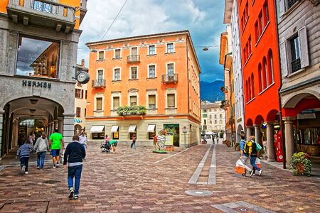 Lugano, Switzerland - August 26, 2013: Via Nassa Street in the city center of luxurious resort Lugano, Ticino canton of Switzerland. People on the background.のeditorial素材