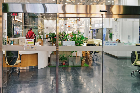 Seoul, South Korea - March 11, 2016: Office and office staff at Modern Seoul City Hall which is open to public in Taepyeongno in Seoul, South Koreaのeditorial素材