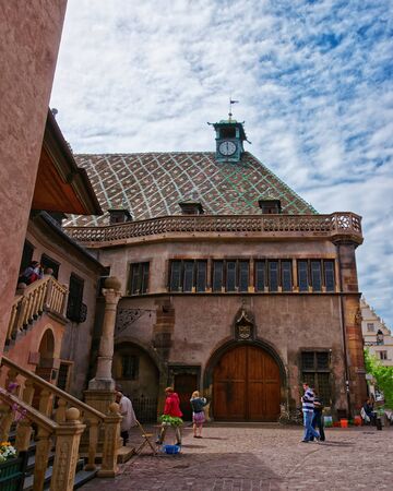 Colmar, France - May 1, 2012: Old custom house or Koifhus at Ancienne Douane Square in the Old city center of Colmar, Haut Rhin in Alsace, of France. People on the backgroundのeditorial素材