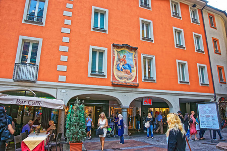 Lugano, Switzerland - August 26, 2013: Tourists at Via Pessina Street in the city center in luxurious resort Lugano in Ticino canton of Switzerland.のeditorial素材