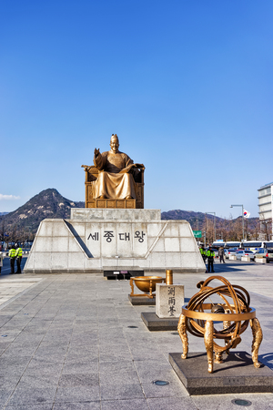 Seoul, South Korea - March 11, 2016: Statue of the King Sejong in Gwanghwamun square in Seoul, South Korea. People in the streetのeditorial素材