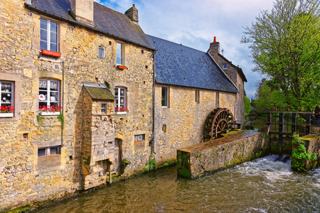 Water mill and Aure River in the old city in Bayeux in Calvados department of Normandy, France.の写真素材