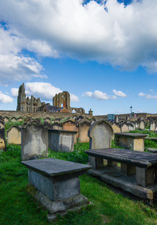 Whitby, England - May 11, 2011: Whitby Churchyard and Cemetery, North Yorkshire in the UK. It is ruins of the Benedictine abbey. Now it is under protection of the English Heritage.のeditorial素材