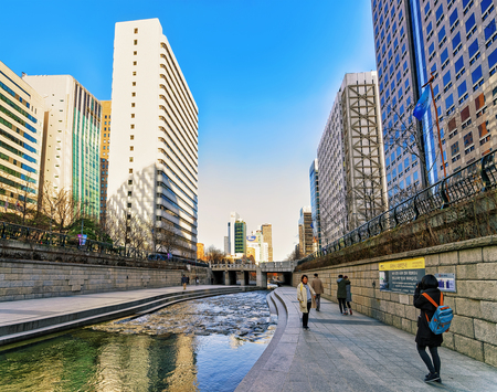 Seoul, South Korea - March 11, 2016: Korean people taking photo at Urban park and the Cheonggyecheon public recreation walkway. Seoul, South Korea.のeditorial素材
