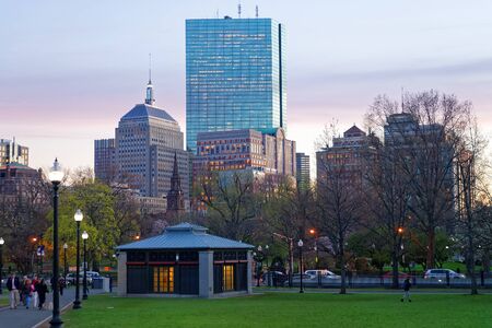 Boston, USA - April 27, 2015: Skyline and Boston Common public park in downtown Boston, Massachusetts, the United States. People on the background. In the eveningのeditorial素材