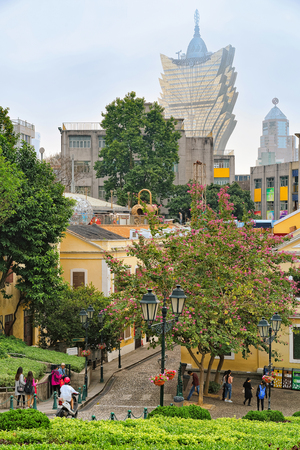 Macao, China - March 8, 2016: Historical city center in Macao, China. People on the backgroundのeditorial素材