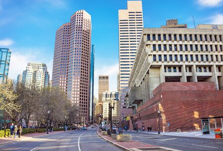 Boston, USA - April 29, 2015: Skyline with Skyscrapers in Congress Street and City Hall, downtown Boston, MA, USA. People on the backgroundのeditorial素材