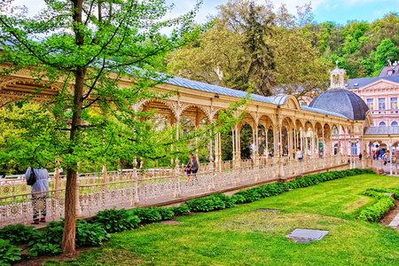 Karlovy vary, Czech republic - May 5, 2014: Park Colonnade with wooden alcove in Karlovy Vary, Czech republic. People on the backgroundのeditorial素材