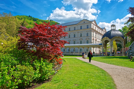 Karlovy vary, Czech republic - May 5, 2014: Park Colonnade with wooden alcove, Karlovy Vary, Czech republic. People on the backgroundのeditorial素材