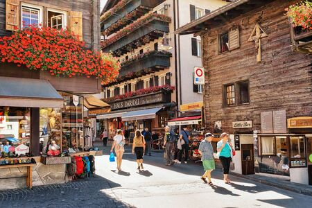 Zermatt, Switzerland - August 24, 2016: Tourists at center in Zermatt, Valais, in Switzerland in summer.のeditorial素材