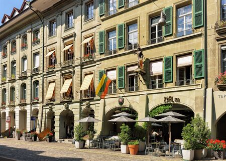 Bern, Switzerland - August 31, 2016: Cafe at Kramgasse street with shopping area in old city center of Bern, Switzerlandのeditorial素材