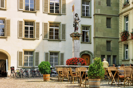 Bern, Switzerland - August 31, 2016: Banneret fountain and Rathausplatz in old city center in Bern, Switzerlandのeditorial素材
