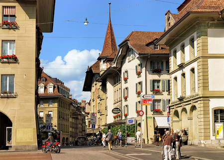 Bern, Switzerland - August 31, 2016: Senior people at Hotelgasse street in old city center of Bern,...