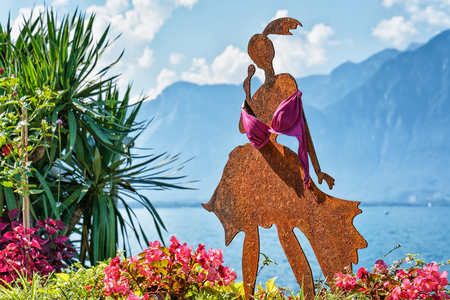Montreux, Switzerland - August 27, 2016: Figure of a woman at promenade of Geneva Lake in Montreux, Vaud canton, Switzerlandのeditorial素材