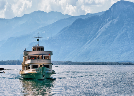 Montreux, Switzerland - August 27, 2016: Excursion ship with people aboard at Geneva Lake at Montreux, Vaud canton, Switzerlandのeditorial素材