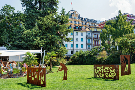Montreux, Switzerland - August 27, 2016: People relaxing at open air cafe at Geneva Lake of Montreux, Vaud canton, Switzerlandのeditorial素材