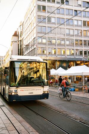 Geneva, Switzerland - August 30, 2016: Running bus on Street in the city center of Geneva,...