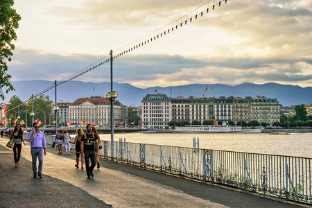 Geneva, Switzerland - August 30, 2016: People on the embankment of Promenade du Lac on Geneva Lake in summer, Geneva, Switzerland.のeditorial素材