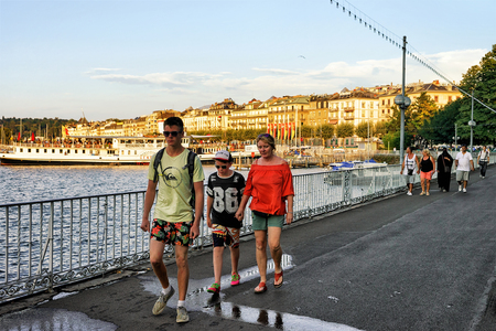Geneva, Switzerland - August 30, 2016: People at the embankment of Promenade du Lac on Geneva Lake in summer, Geneva, Switzerland.のeditorial素材