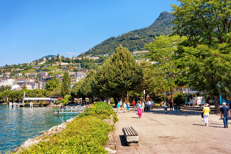Montreux, Switzerland - August 27, 2016: People walking at the promenade at Geneva Lake in Montreux, Vaud canton, Switzerlandのeditorial素材