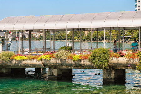 Montreux, Switzerland - August 27, 2016: People at Landing stage on Geneva Lake in Montreux, Vaud canton, Switzerlandのeditorial素材