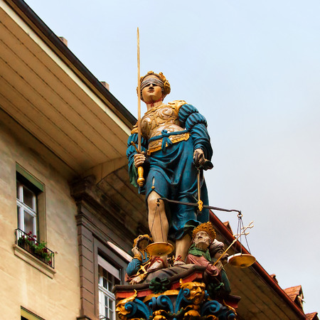 Justice fountain at old city center of Bern, Switzerlandの写真素材
