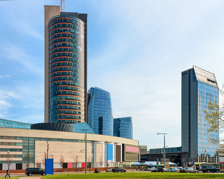 Downtown with skyscrapers at the city center of Vilnius, Lithuania, in spring. People on the backgroundの写真素材